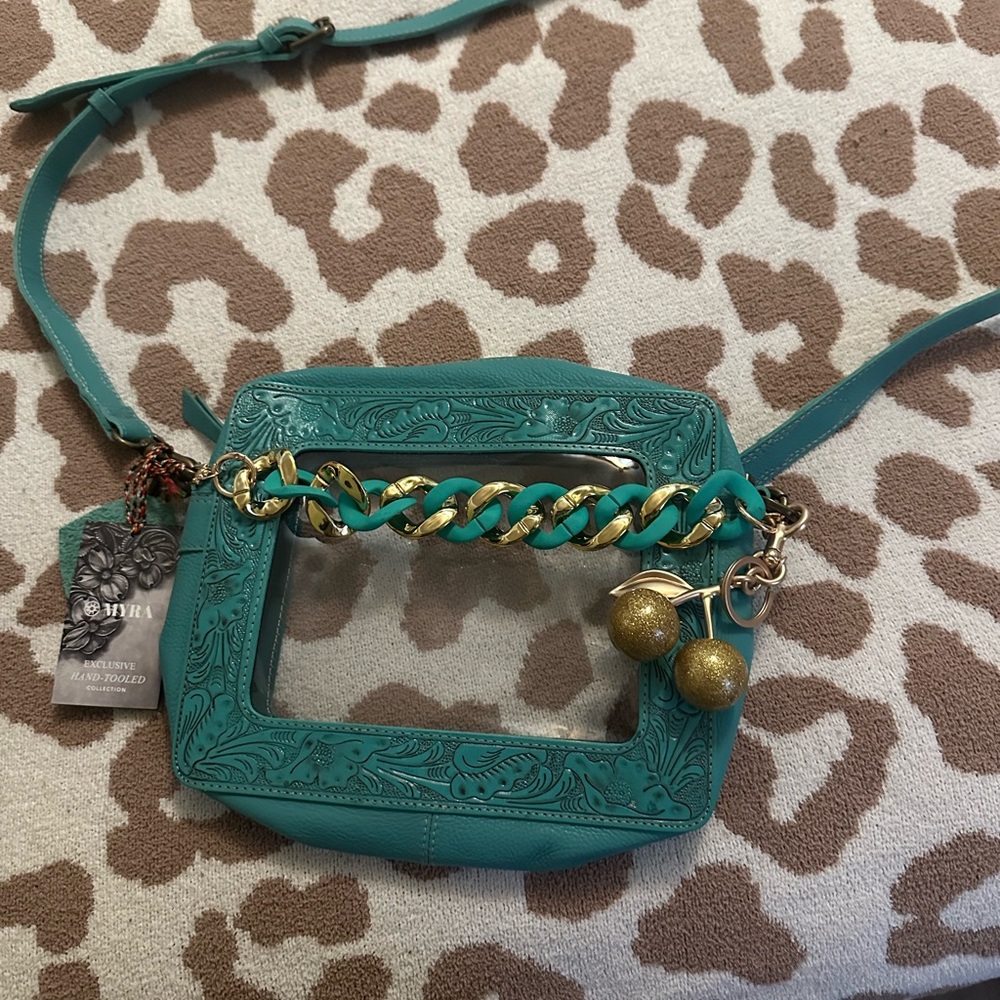 Myra Bag Teal Tooled Leather Crossbody charm and chain not included.